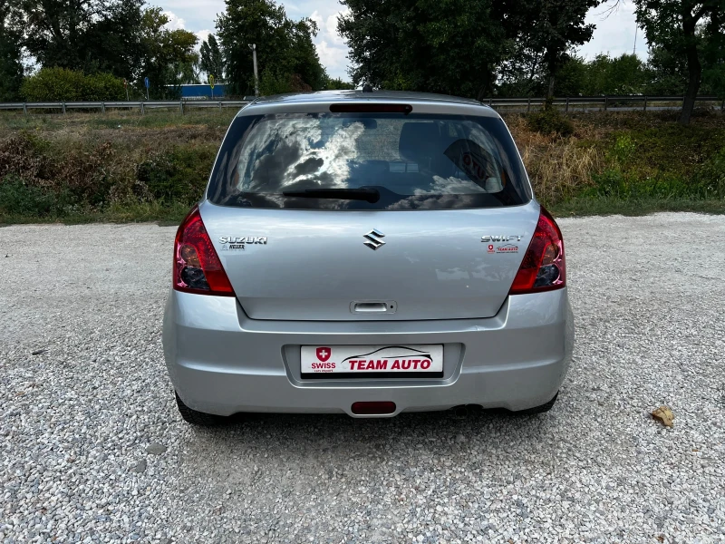 Suzuki Swift 1.3I SWISS EDITION , снимка 4 - Автомобили и джипове - 47029349