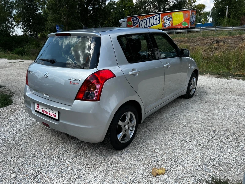 Suzuki Swift 1.3I SWISS EDITION , снимка 5 - Автомобили и джипове - 47029349