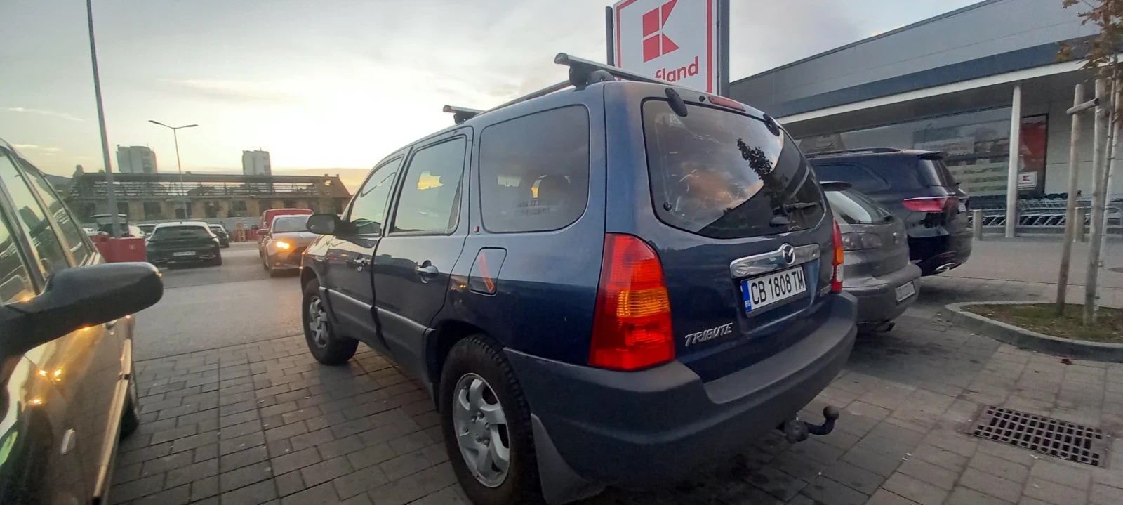 Mazda Tribute 2.0 - изображение 4