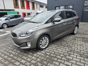 ������ Kia Carens