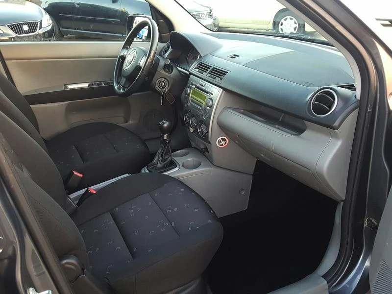 Mazda 2 1.4 HDI, снимка 11 - Автомобили и джипове - 16444020