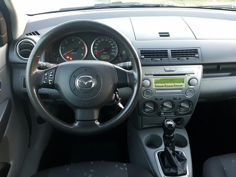 Mazda 2 1.4 HDI, снимка 13 - Автомобили и джипове - 16444020