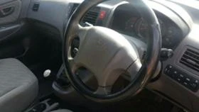 Hyundai Tucson 2,0 CRDI, снимка 6