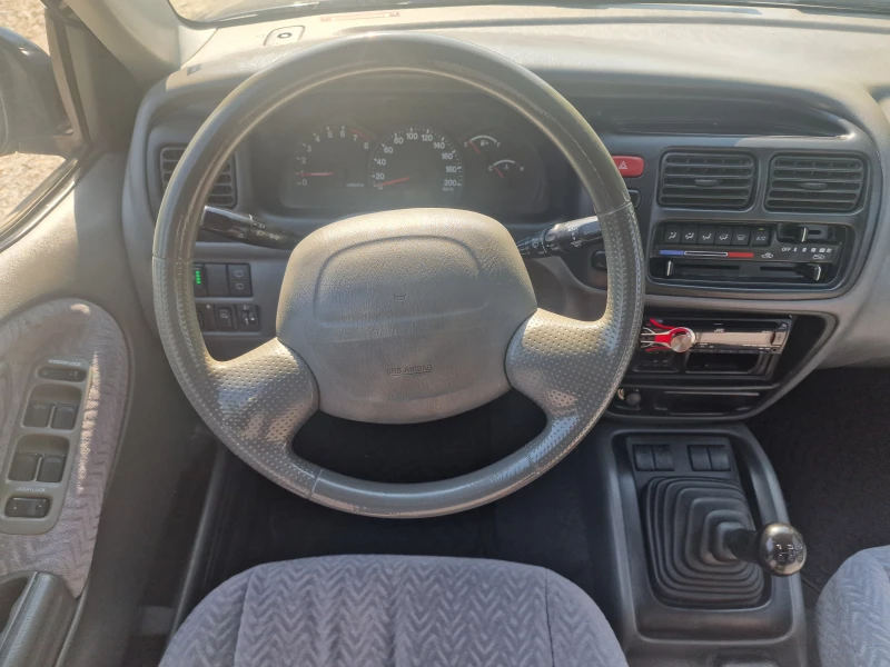Suzuki Grand vitara 2.5 LPG, снимка 15 - Автомобили и джипове - 51359006