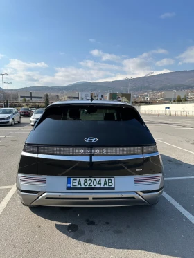 Hyundai Ioniq 5 Uniq AWD, 2 комп гуми, сменен ICCU, теглич, гаранц - 29200 € / 57110.24 лв. - 99738753 4