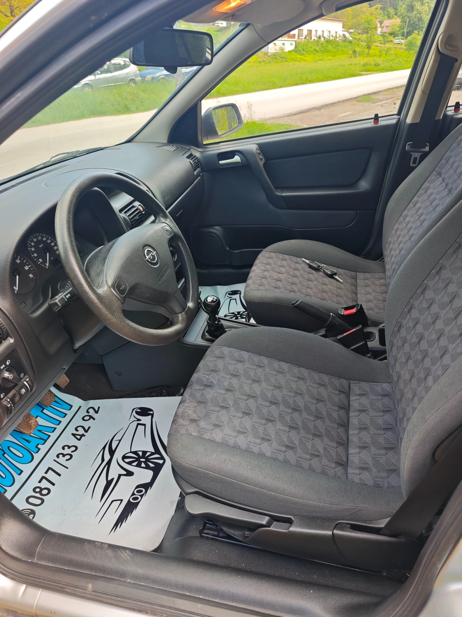 Opel Astra 1.6I НОВ ВНОС, снимка 10 - Автомобили и джипове - 54605195