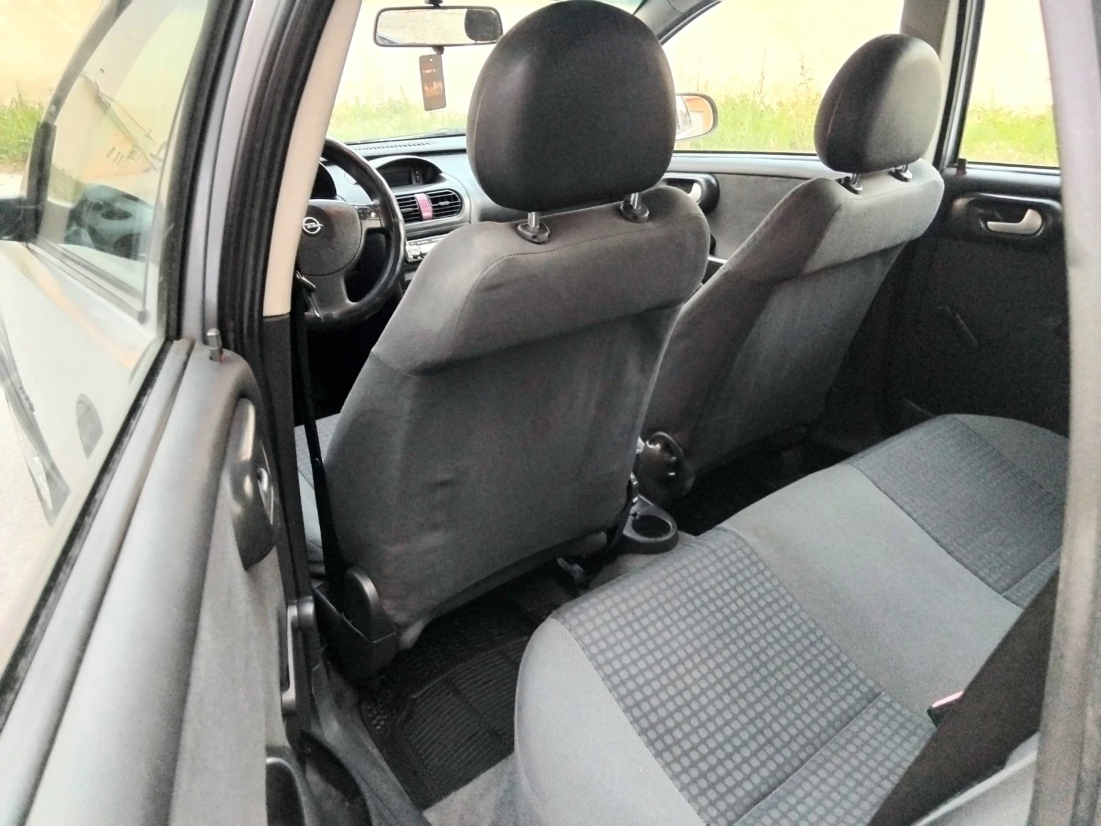 Opel Corsa 1.2i.75k + КЛИМА ГАЗ вписана в талона , снимка 14 - Автомобили и джипове - 55598838