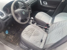 Skoda Roomster 1.2htp 70кс BZG, снимка 9