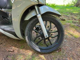 Kymco People S, снимка 9