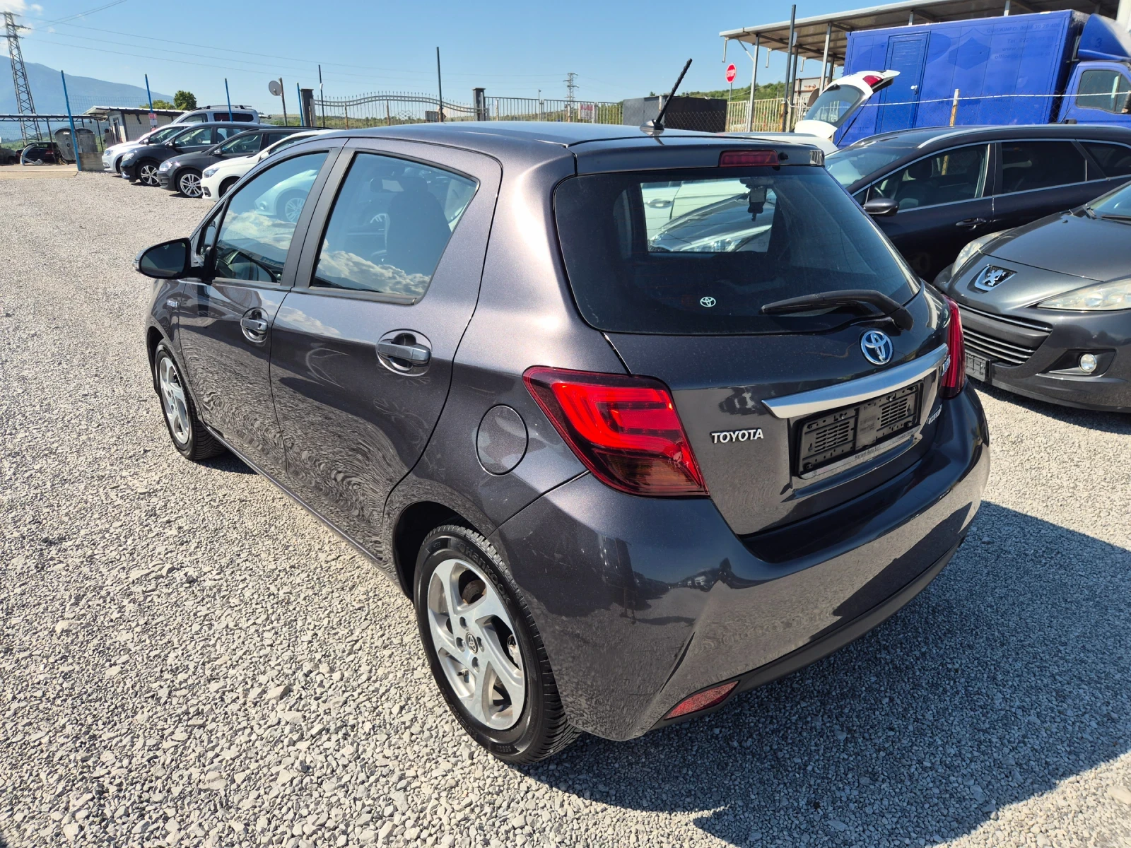 Toyota Yaris 1.5 Hybrid E6b/101к.с., снимка 4 - Автомобили и джипове - 54889123