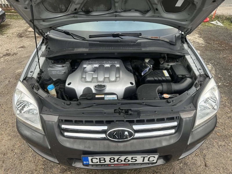 Kia Sportage 2.0/16v 4X4 , снимка 17 - Автомобили и джипове - 53104109