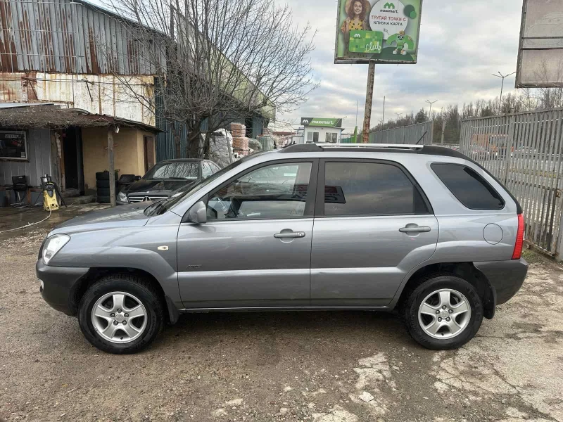 Kia Sportage 2.0/16v 4X4 , снимка 8 - Автомобили и джипове - 53104109