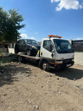     Mitsubishi Canter 3  1     
