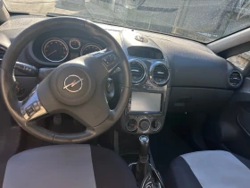 Opel Corsa 1.4  90 к.с., снимка 7