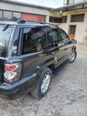 Jeep Grand cherokee 4.0 Quadra-Track2 Laredo , снимка 4