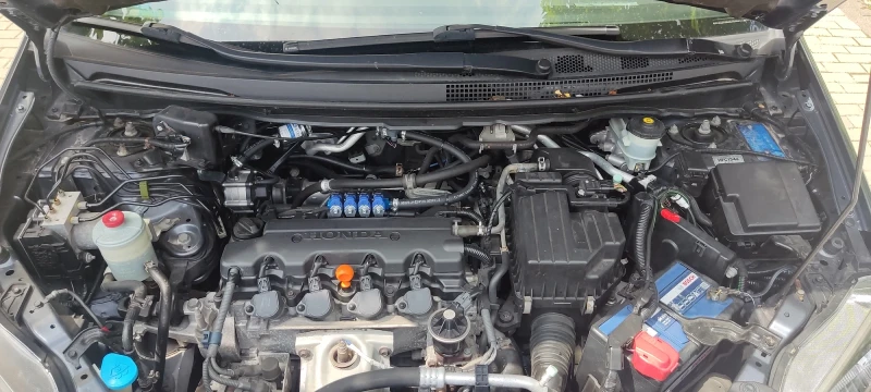 Honda Fr-v 1.8, снимка 10 - Автомобили и джипове - 49580656