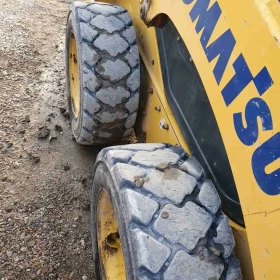 Мини челни товарачи Komatsu SK 714, снимка 4