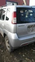 Suzuki Ignis 1.3 VVT 4x4, снимка 11