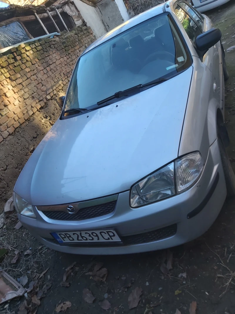 Mazda 323, снимка 1 - Автомобили и джипове - 49528014