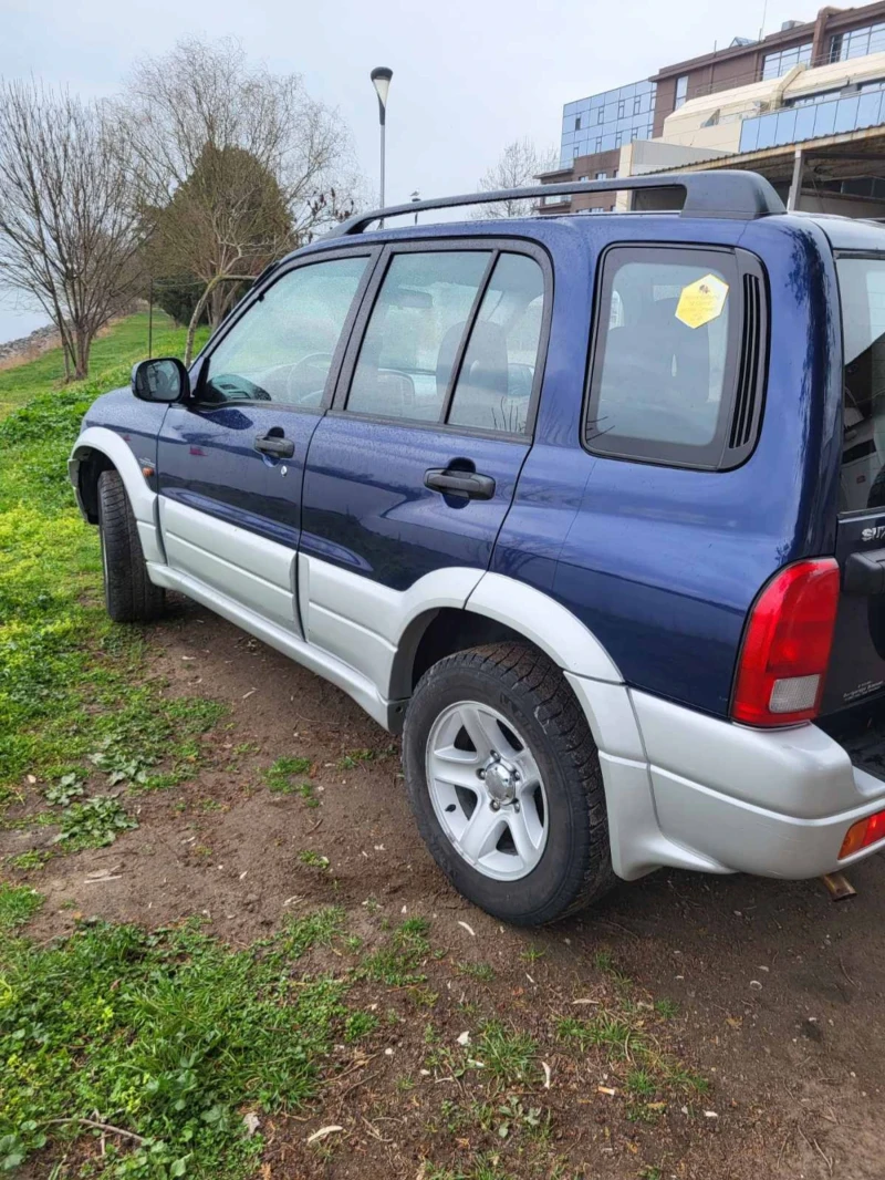 Suzuki Grand vitara 2.0 128к.с Автомат, снимка 16 - Автомобили и джипове - 48539245