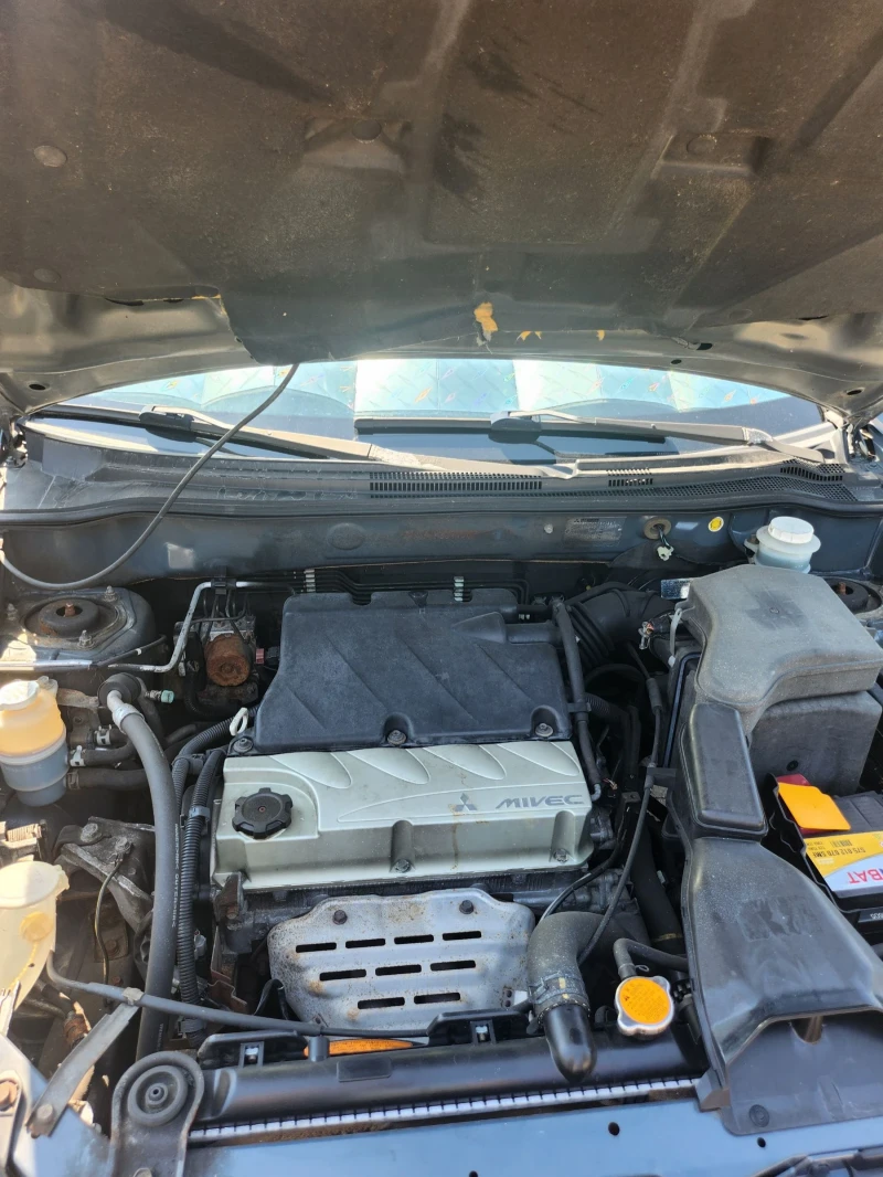 Mitsubishi Outlander, снимка 7 - Автомобили и джипове - 52373392