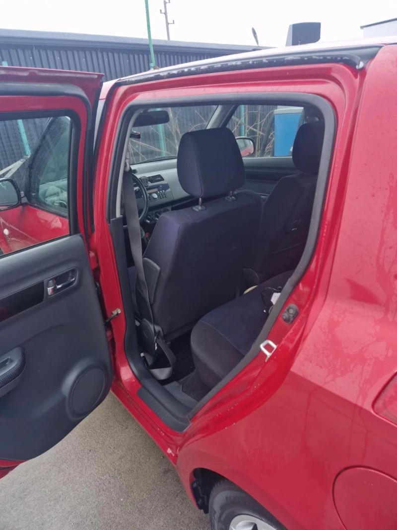 Suzuki Swift 1.3 4х4, снимка 13 - Автомобили и джипове - 49745330