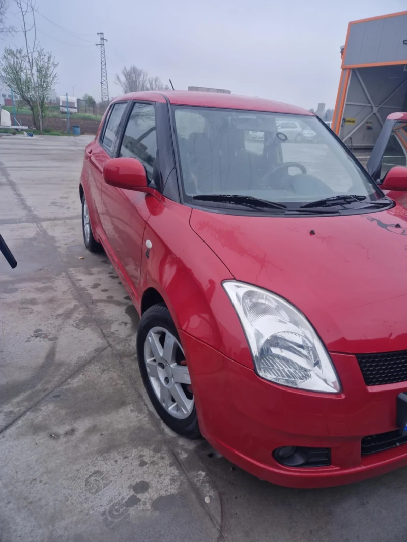 Suzuki Swift 1.3 4х4, снимка 6 - Автомобили и джипове - 49745330