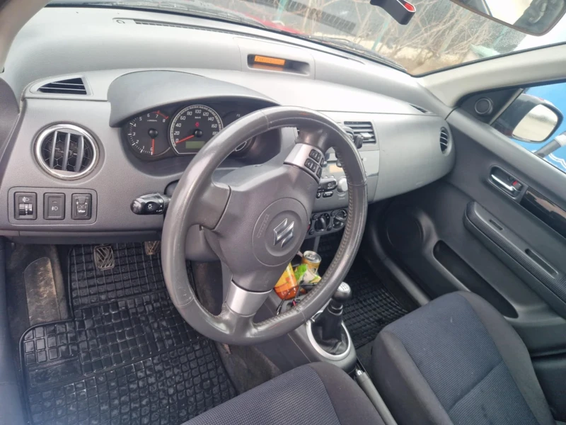 Suzuki Swift 1.3 4х4, снимка 12 - Автомобили и джипове - 49745330