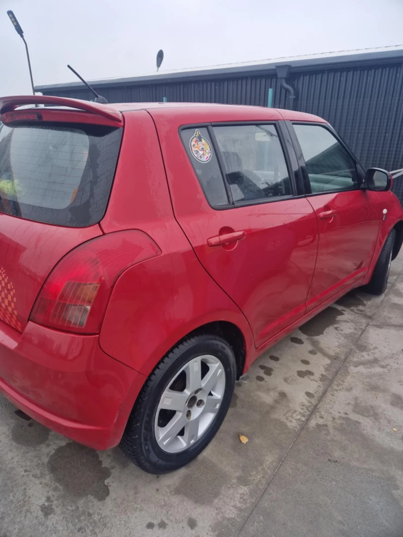 Suzuki Swift 1.3 4х4, снимка 8 - Автомобили и джипове - 49745330