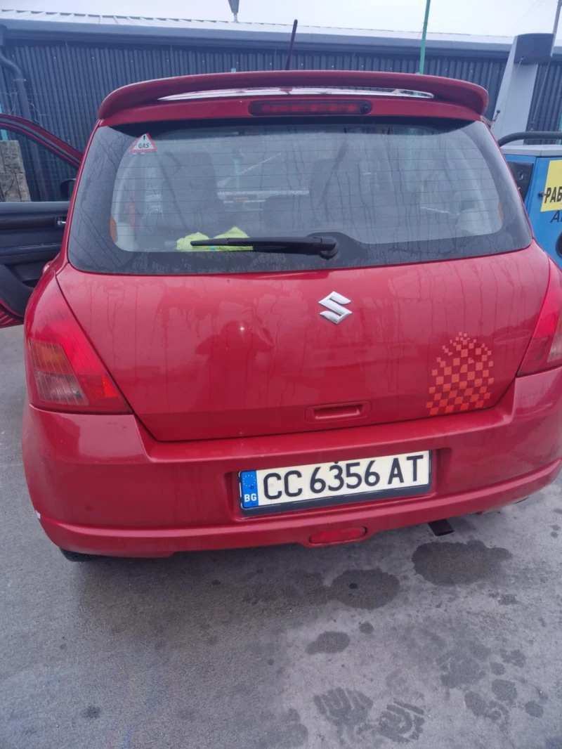 Suzuki Swift 1.3 4х4, снимка 7 - Автомобили и джипове - 49745330