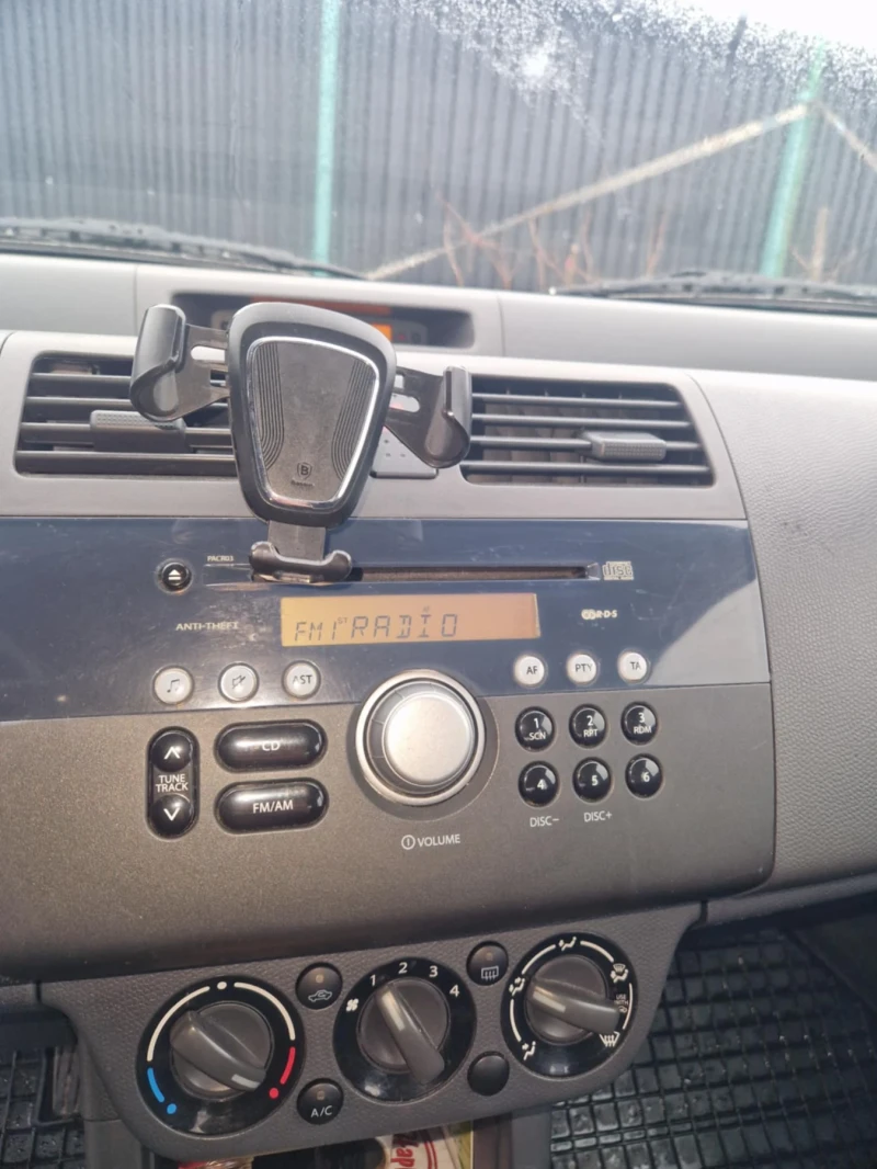 Suzuki Swift 1.3 4х4, снимка 11 - Автомобили и джипове - 49745330