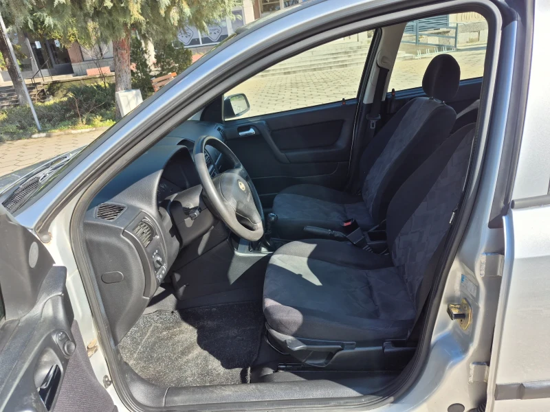 Opel Astra 1.6 Стария 75 Коня* * , снимка 13 - Автомобили и джипове - 53582216