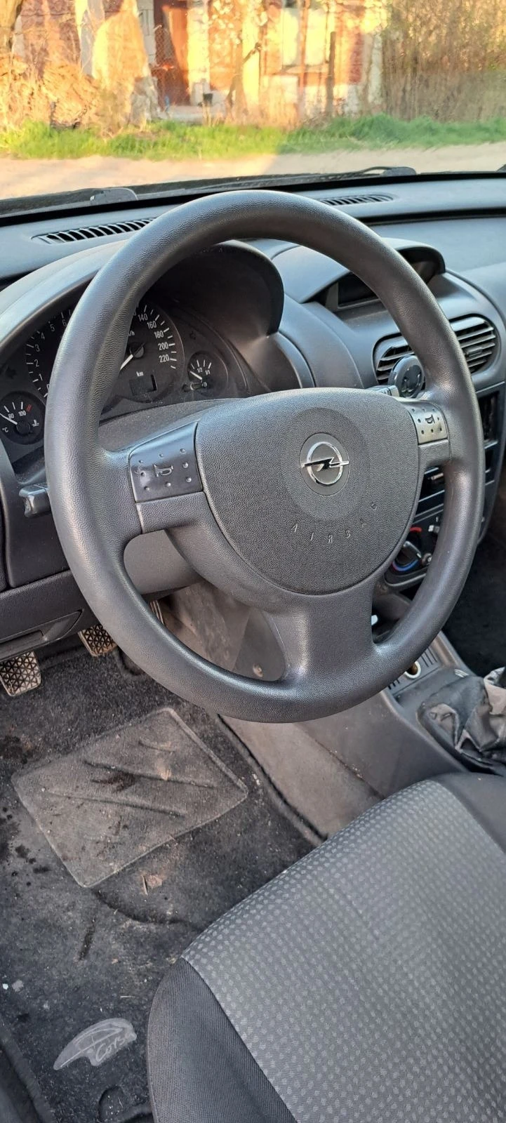 Opel Corsa 1.2 16в 75кс, снимка 13 - Автомобили и джипове - 47479239