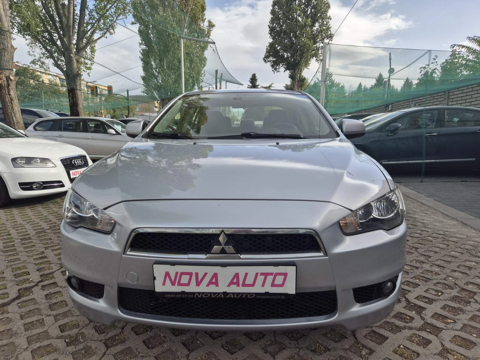 Mitsubishi Lancer 1.5i-109кс - изображение 6