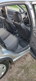 Opel Corsa 1.2 16в 75кс, снимка 11