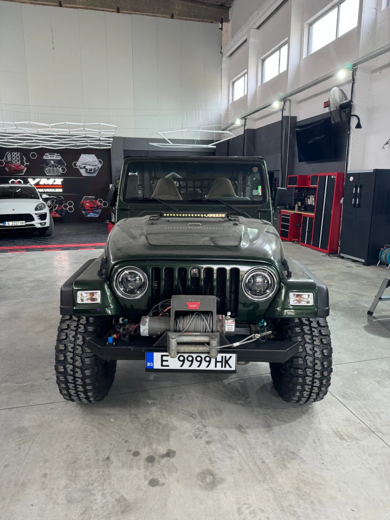 Jeep Wrangler 4.0L Sport, снимка 2 - Автомобили и джипове - 47967115