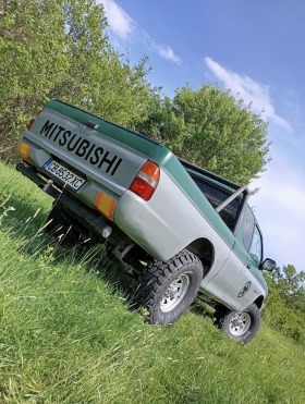 Mitsubishi L200 2.5 100к. Боя раптор, снимка 11 - Автомобили и джипове - 45356371