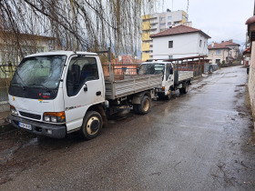 Isuzu Nqr, снимка 1 - Камиони - 45494482