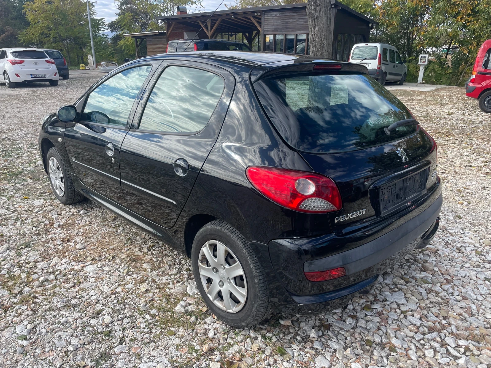 Peugeot 206 + 1.4i  - изображение 5