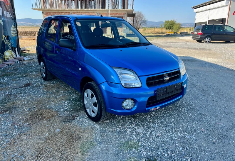 Subaru Justy 1.3i 4x4, снимка 2 - Автомобили и джипове - 47537421