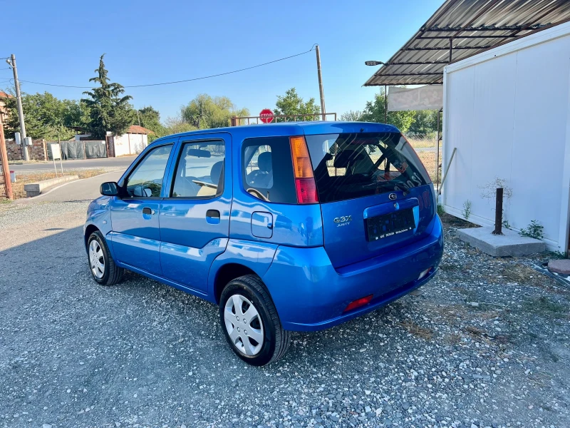 Subaru Justy 1.3i 4x4, снимка 4 - Автомобили и джипове - 47537421