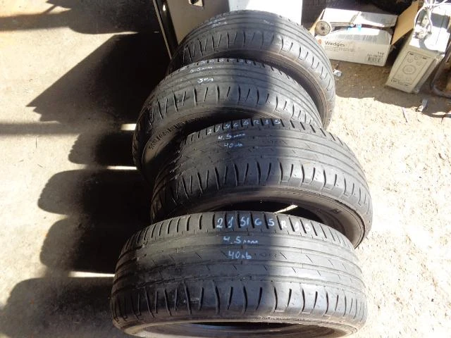 Гуми Летни 215/65R15, снимка 12 - Гуми и джанти - 15828121