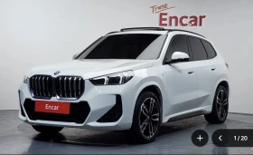 ������ BMW iX1