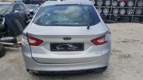     Ford Mondeo 1.5i -   ~11 .