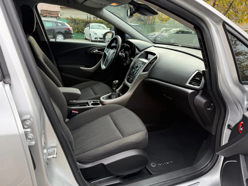 Opel Astra 1.4i Turbo Enjoi EURO5a, снимка 11 - Автомобили и джипове - 52361602