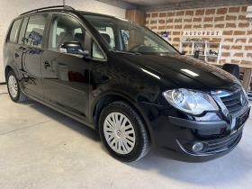 VW Touran 2.0 Бензин/Метан, снимка 2 - Автомобили и джипове - 43096552