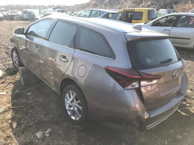 Toyota Auris Hybrid 1.8 VVTi Touring Sports, снимка 1 - Автомобили и джипове - 24445857