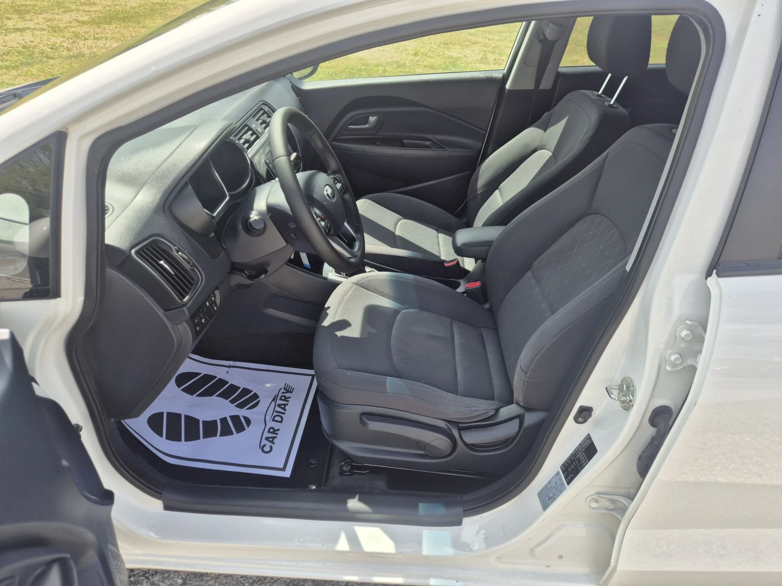 Kia Rio 1.4Crdi , снимка 11 - Автомобили и джипове - 54229398