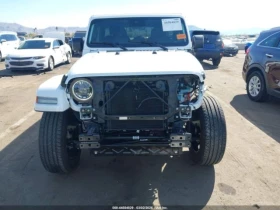 Jeep Wrangler 4XE SAHARA* КОЖЕН САЛОН  - 26300 € / 51438.33 лв. - 22058609 3