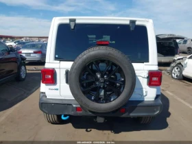 Jeep Wrangler 4XE SAHARA* КОЖЕН САЛОН  - 26300 € / 51438.33 лв. - 22058609 13